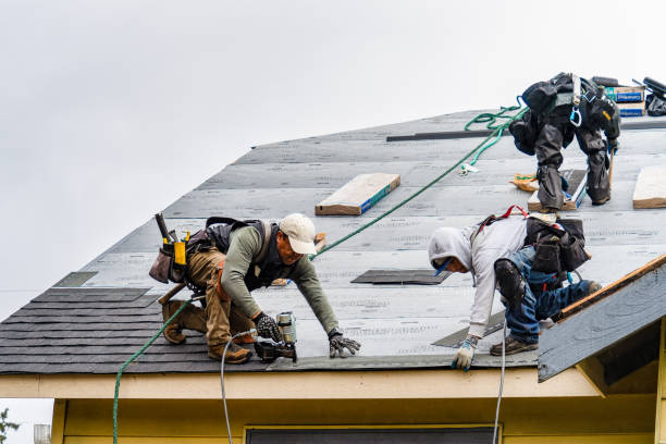 Professional Roofing technician working in Aurora, UT